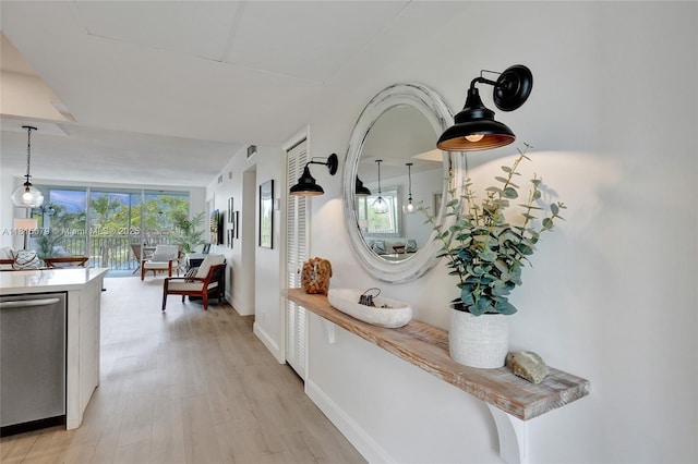 3150 N Course Ln Unit 405, Pompano Beach, FL 33069 - hall featuring light wood-type flooring and baseboards