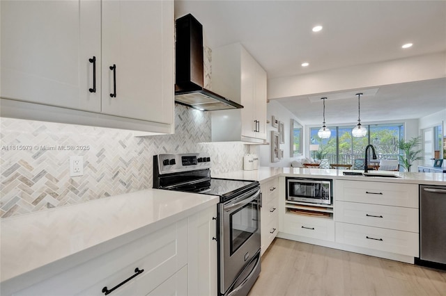 3150 N Course Ln Unit 405, Pompano Beach, FL 33069 - kitchen featuring appliances with stainless steel finishes, wall chimney range hood, a sink, light countertops, and decorative backsplash