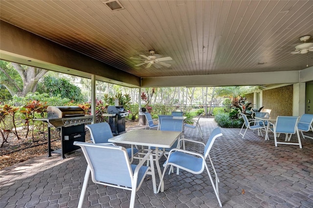 3150 N Course Ln Unit 405, Pompano Beach, FL 33069 - view of patio with outdoor dining space, ceiling fan, and a grill