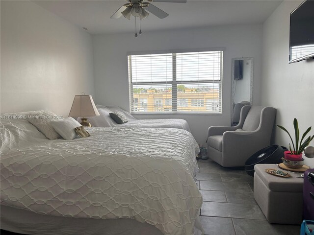 9041 Sunrise Lakes Blvd Unit 311, Sunrise, FL 33322 - tiled bedroom with ceiling fan