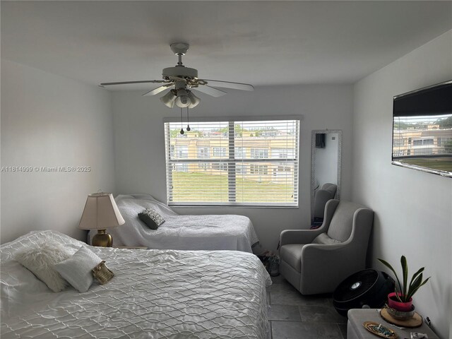 9041 Sunrise Lakes Blvd Unit 311, Sunrise, FL 33322 - bedroom with a ceiling fan