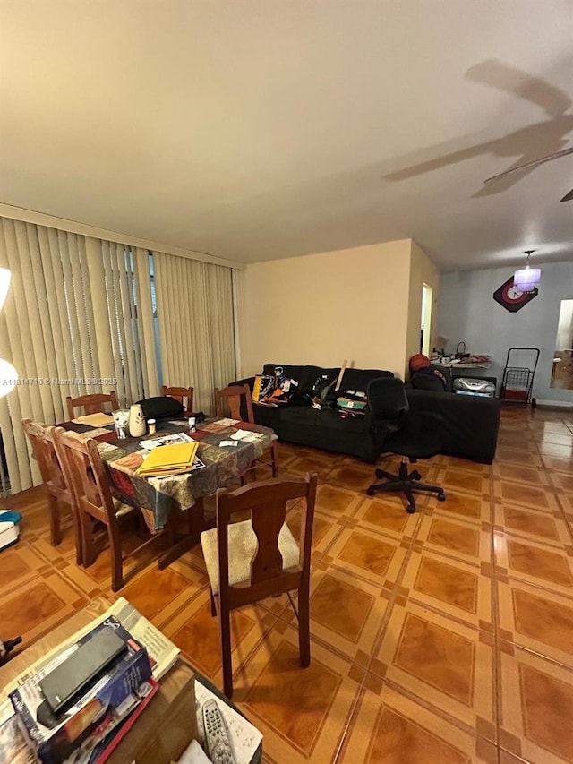 920 Ne 199th St 2S Apt 217, Miami, FL 33179 - living room with ceiling fan and light tile patterned flooring