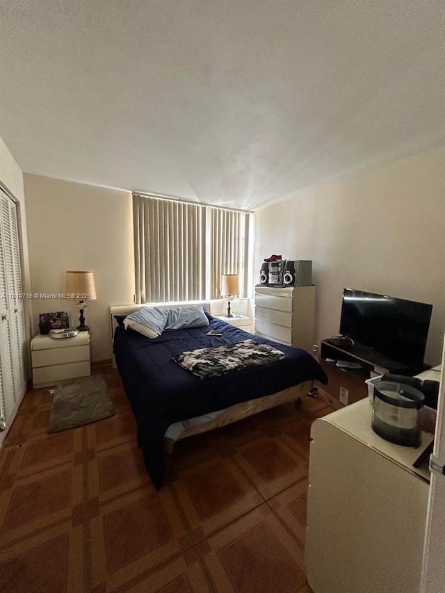 920 Ne 199th St 2S Apt 217, Miami, FL 33179 - bedroom featuring a closet