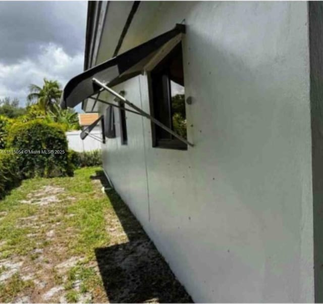 737 NW 6th St, Hallandale Beach, FL 33009 - view of property exterior with stucco siding