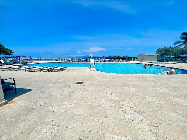 19201 Collins Ave Unit 427, Sunny Isles Beach, FL 33160 - community pool with a patio area