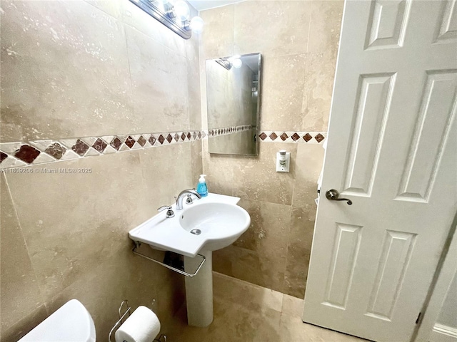 19201 Collins Ave Unit 427, Sunny Isles Beach, FL 33160 - bathroom with tile walls and tile patterned flooring