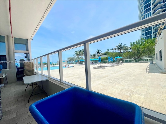 19201 Collins Ave Unit 427, Sunny Isles Beach, FL 33160 - view of patio featuring a community pool