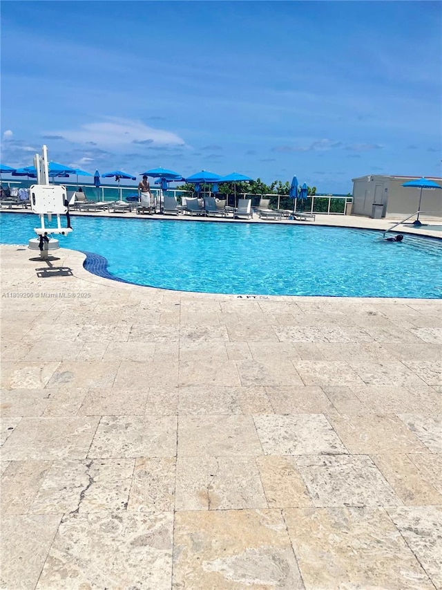 19201 Collins Ave Unit 427, Sunny Isles Beach, FL 33160 - community pool with a patio area