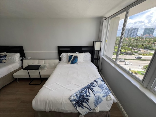19201 Collins Ave Unit 427, Sunny Isles Beach, FL 33160 - bedroom with wood finished floors and a view of city