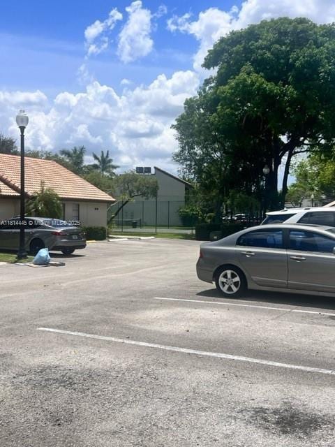 958 Mockingbird Ln Unit 511, Plantation, FL 33324 - view of uncovered parking lot