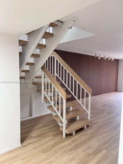 958 Mockingbird Ln Unit 511, Plantation, FL 33324 - stairs featuring wood finished floors