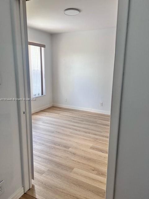 958 Mockingbird Ln Unit 511, Plantation, FL 33324 - empty room with light wood-style flooring and baseboards