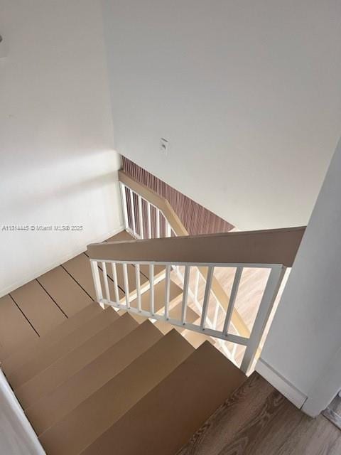 958 Mockingbird Ln Unit 511, Plantation, FL 33324 - stairs featuring wood finished floors