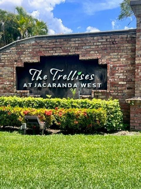 958 Mockingbird Ln Unit 511, Plantation, FL 33324 - community sign featuring a yard