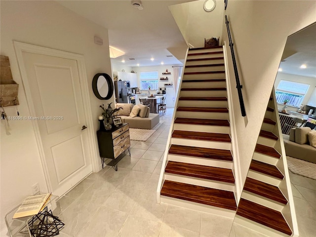 12254 NW 24th Pl, Miami, FL 33167 - stairs with tile patterned flooring, recessed lighting, and healthy amount of natural light
