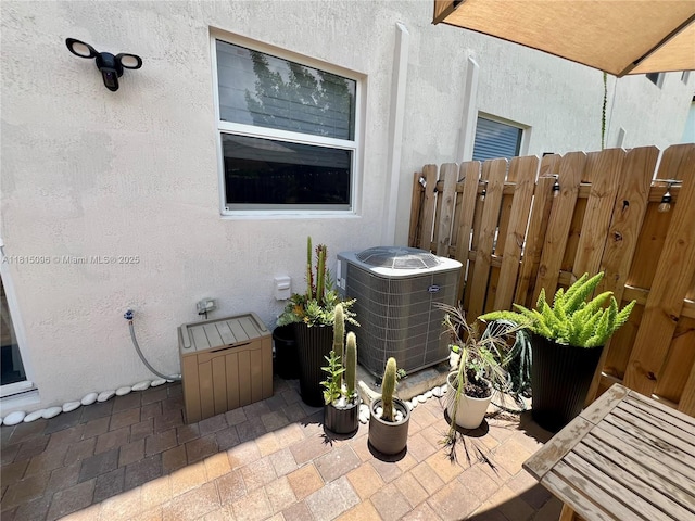 12254 NW 24th Pl, Miami, FL 33167 - exterior view of central air condition unit and stucco siding
