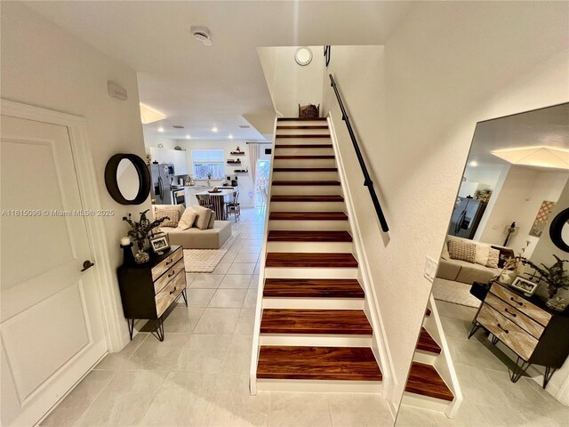 12254 NW 24th Pl, Miami, FL 33167 - staircase featuring tile patterned floors