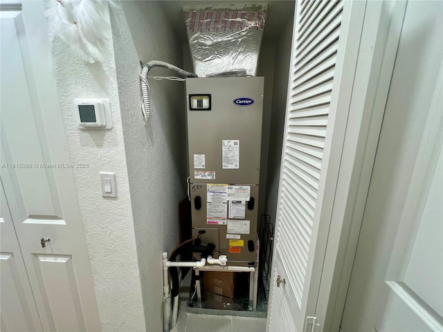 12254 NW 24th Pl, Miami, FL 33167 - utility room with heating unit