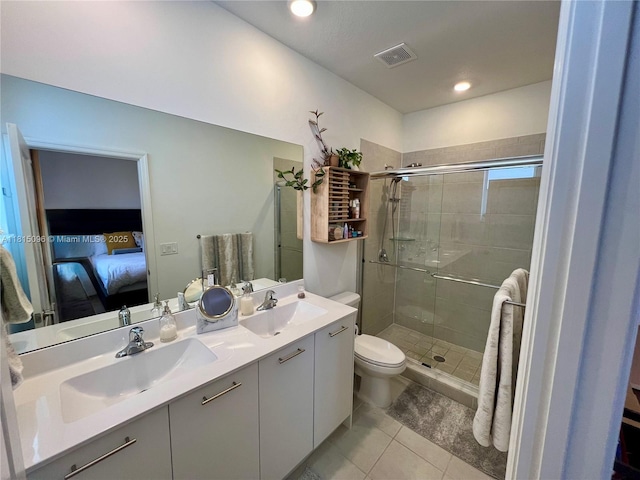 12254 NW 24th Pl, Miami, FL 33167 - bathroom with double vanity, a stall shower, tile patterned floors, toilet, and ensuite bath
