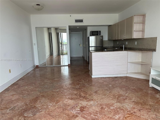 555 NE 15th St Unit 515, Miami, FL 33132 - kitchen featuring open shelves, appliances with stainless steel finishes, dark countertops, backsplash, and a sink