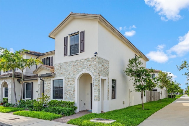 12945 SW 234th St, Homestead, FL 33032 - view of front of house featuring stucco siding and stone siding