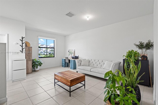 12945 SW 234th St, Homestead, FL 33032 - living area with light tile patterned floors and baseboards