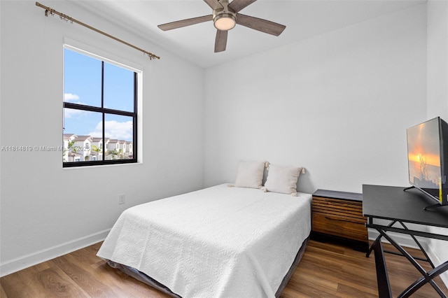 12945 SW 234th St, Homestead, FL 33032 - bedroom featuring wood finished floors, baseboards, and a ceiling fan
