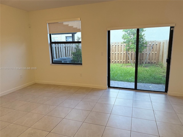 23235 SW 129th Path, Miami, FL 33170 - empty room with light tile patterned flooring and baseboards