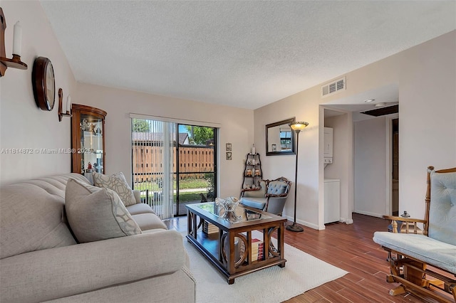 9808 Hammocks Blvd Unit 102-23, Miami, FL 33196 - living room with a textured ceiling, wood finished floors, and baseboards