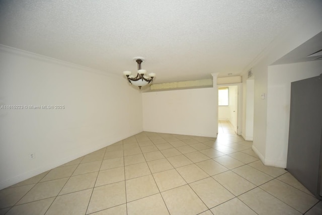 1750 W 56th St Unit 108, Hialeah, FL 33012 - spare room with a textured ceiling, crown molding, a chandelier, and light tile patterned floors