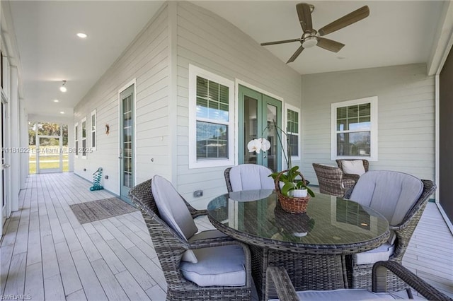 910 Gen George Patton Ave, La Belle, FL 33935 - deck featuring a ceiling fan and outdoor dining space