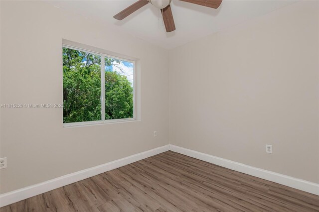 813 NW 3rd Ave, Fort Lauderdale, FL 33311 - empty room featuring wood finished floors and a ceiling fan