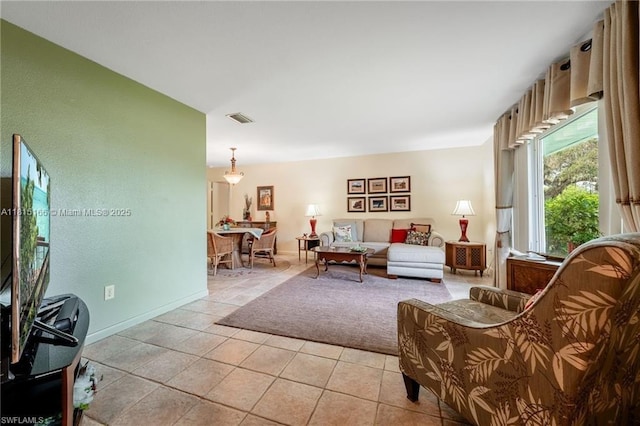 4559 Springview Cir, La Belle, FL 33935 - living area featuring light tile patterned flooring