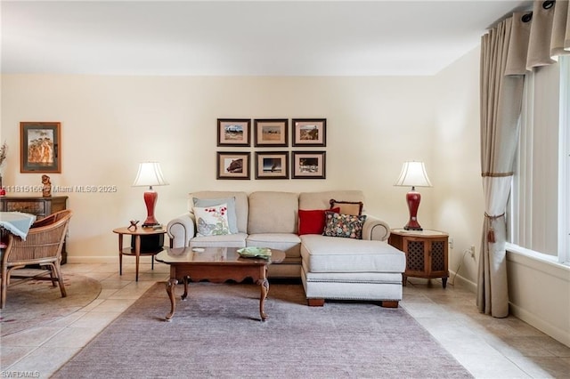4559 Springview Cir, La Belle, FL 33935 - living area with light tile patterned floors and baseboards