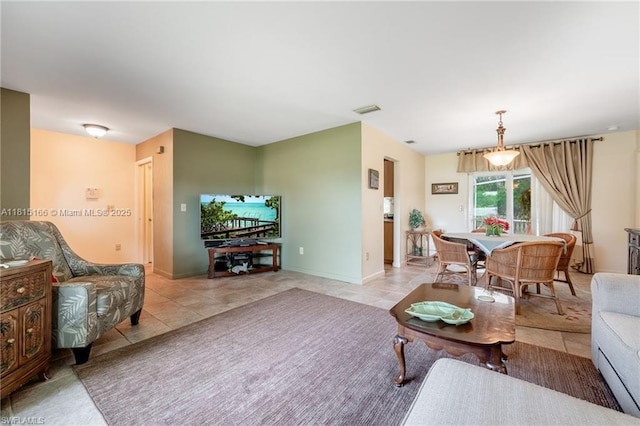 4559 Springview Cir, La Belle, FL 33935 - living area with light tile patterned floors