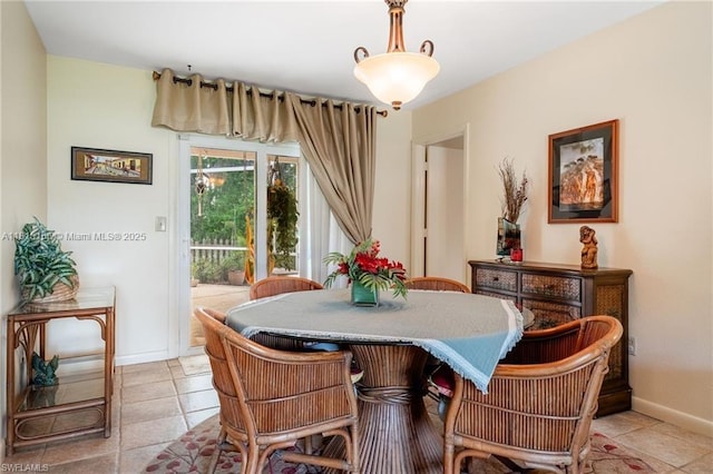 4559 Springview Cir, La Belle, FL 33935 - dining room featuring baseboards and light tile patterned floors