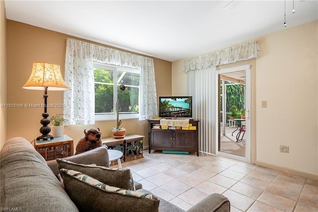 4559 Springview Cir, La Belle, FL 33935 - living room with baseboards and tile patterned floors