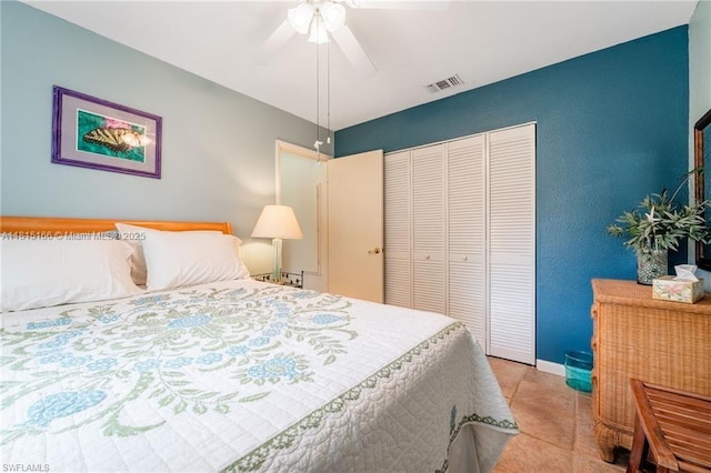 4559 Springview Cir, La Belle, FL 33935 - bedroom with a closet, light tile patterned floors, and a ceiling fan