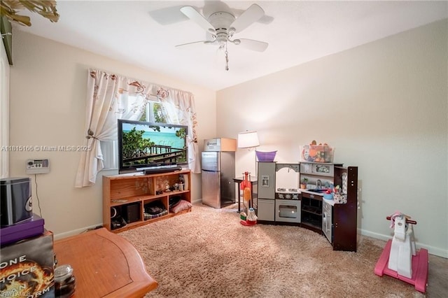 4559 Springview Cir, La Belle, FL 33935 - carpeted living room featuring a ceiling fan and baseboards