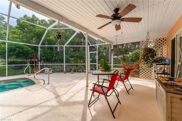 4559 Springview Cir, La Belle, FL 33935 - view of patio featuring ceiling fan, glass enclosure, and an outdoor pool