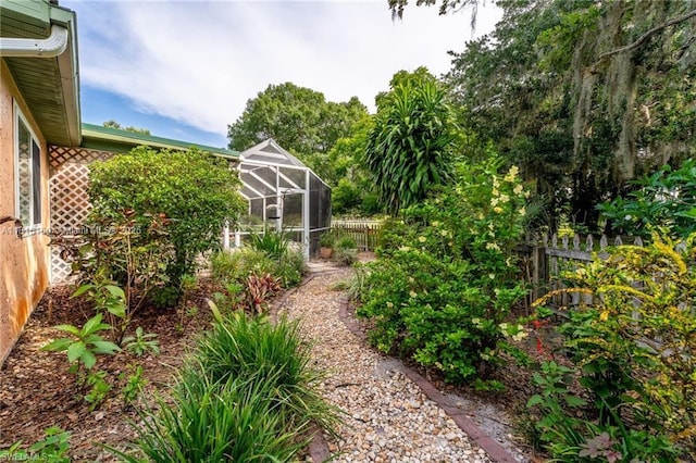 4559 Springview Cir, La Belle, FL 33935 - fenced backyard with a lanai