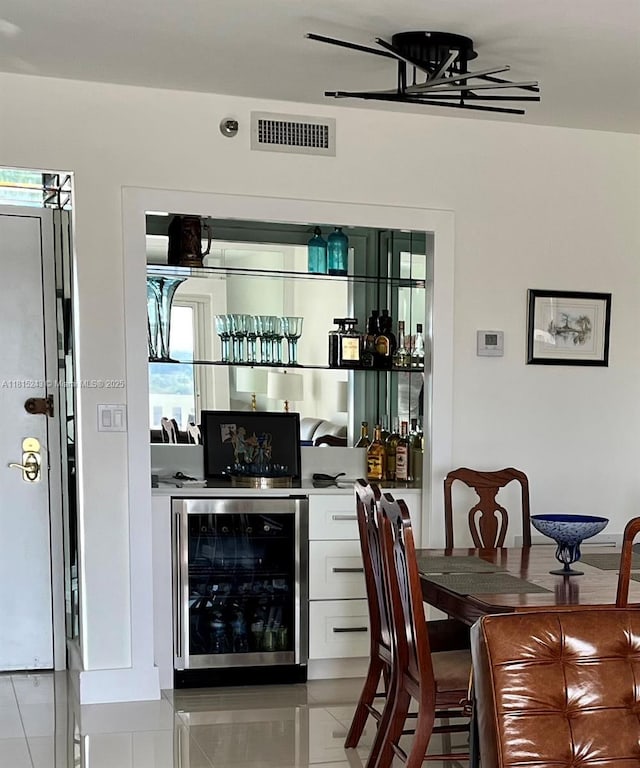 4001 Hillcrest Dr Unit 1014, Hollywood, FL 33021 - indoor bar with beverage cooler and light tile patterned floors