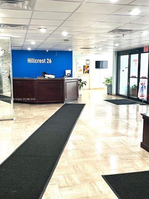 4001 Hillcrest Dr Unit 1014, Hollywood, FL 33021 - reception with a drop ceiling