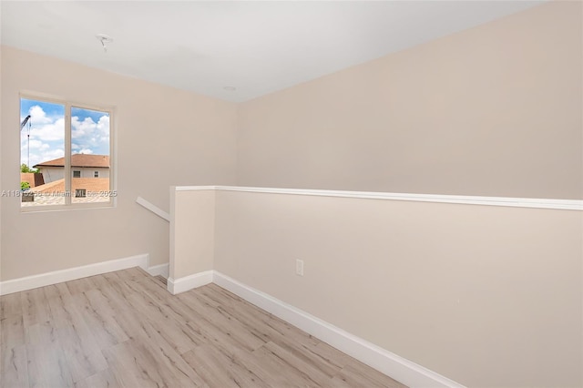 811 NW 3rd Ave, Fort Lauderdale, FL 33311 - spare room featuring light wood-style flooring and baseboards