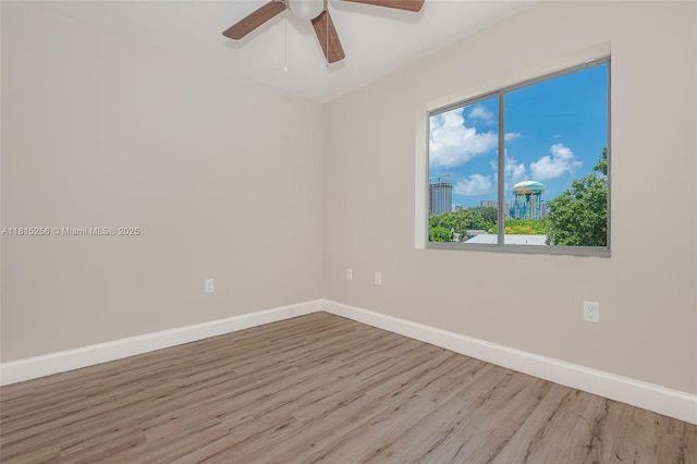811 NW 3rd Ave, Fort Lauderdale, FL 33311 - empty room featuring wood finished floors and ceiling fan