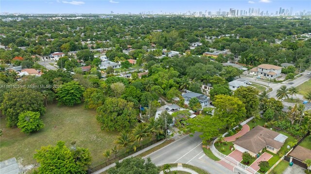 1051 NE 149th St, Miami, FL 33161 - view of property location featuring skyline and a tree filled landscape