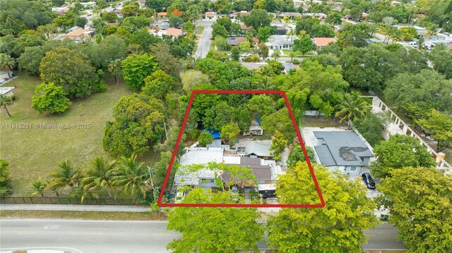 1051 NE 149th St, Miami, FL 33161 - aerial view of residential area with property parcel outlined