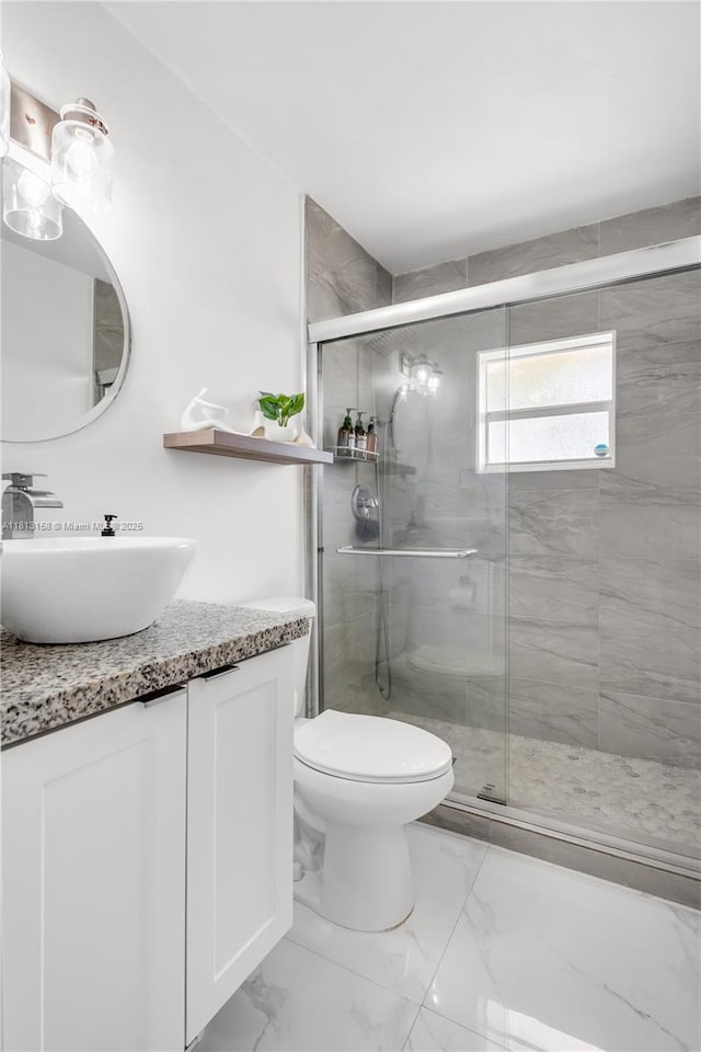 5408 SW 138th Ave, Miami, FL 33175 - bathroom featuring vanity, a stall shower, toilet, and marble finish floors