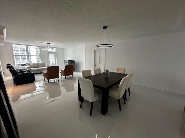 2851 S Ocean Blvd Unit 6V, Boca Raton, FL 33432 - dining space with a textured ceiling
