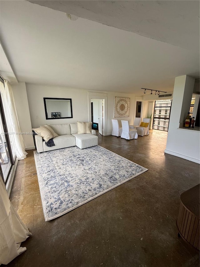 5701 Biscayne Blvd Unit 701, Miami, FL 33137 - living room featuring track lighting and baseboards